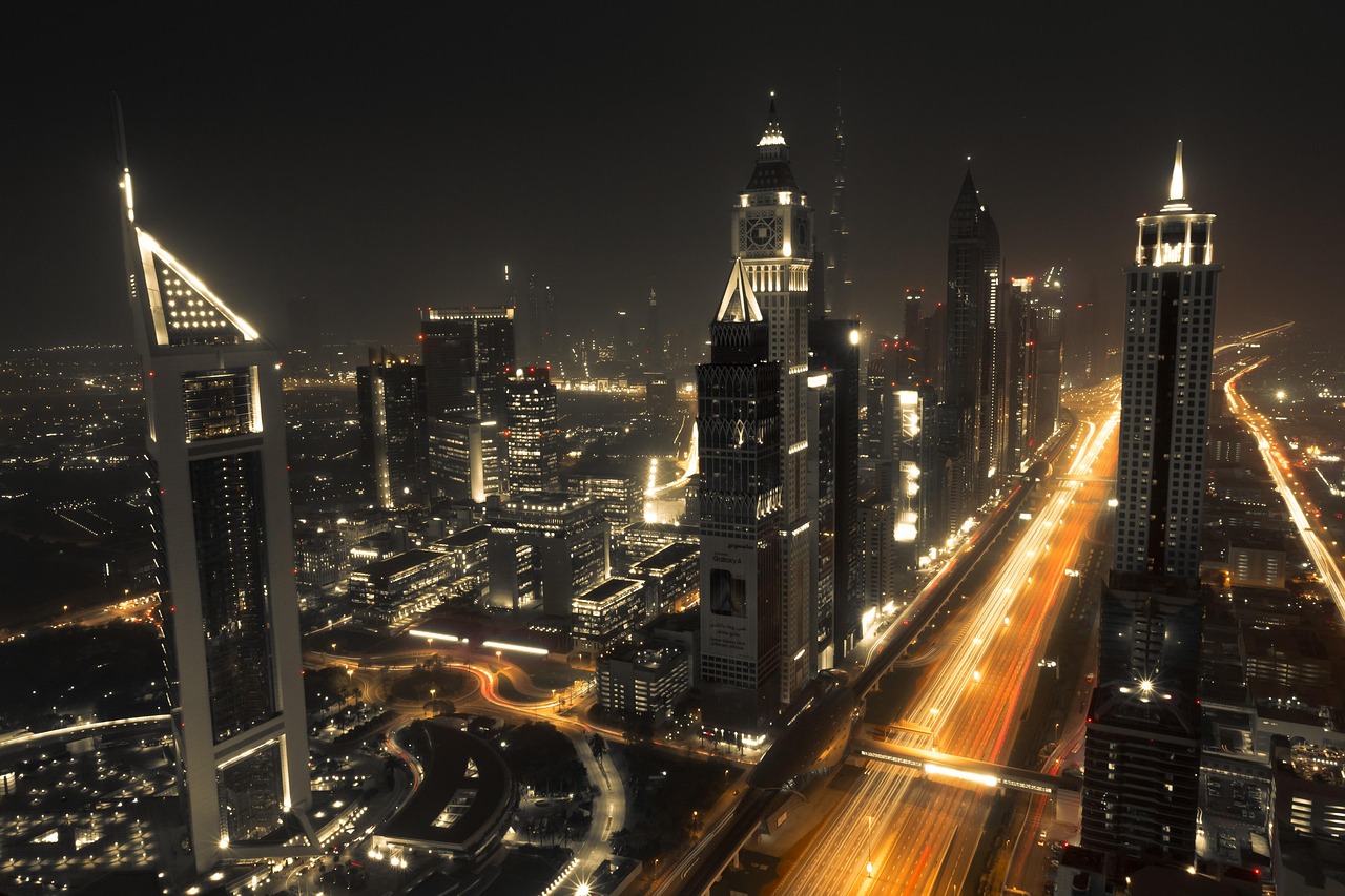 Dubai towers and the Sheikh Zayed Road lit at night